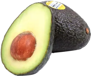 Fresh Halved Avocado With Pit PNG image