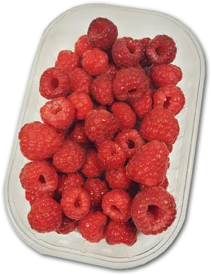 Fresh Raspberriesin Plastic Container PNG image
