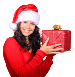 Girlin Santa Hatwith Christmas Gift PNG image