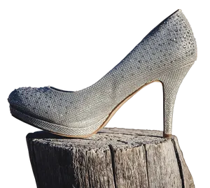 Glittering Stilettoon Wooden Stump