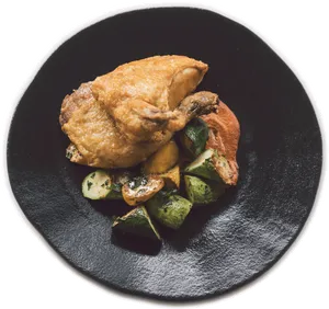 Gourmet Fried Chicken Dish PNG image