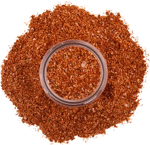 Grounded Spice Pile With Glass Container PNG image