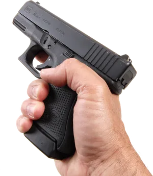 Hand Holding Glock Pistol PNG image