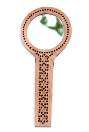 Handheld Wooden Mirrorwith Intricate Carvings PNG image