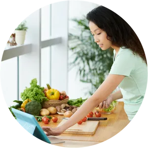 Healthy Meal Preparation Woman Cooking Vegetables PNG image