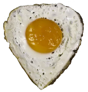 Heart Shaped Fried Eggon Black Background PNG image