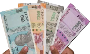 Indian Currency Notes Fanned In Hand PNG image