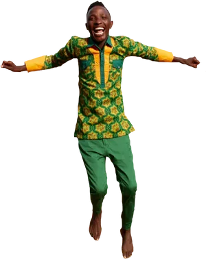 Joyful Boy Jumpingin Traditional Outfit