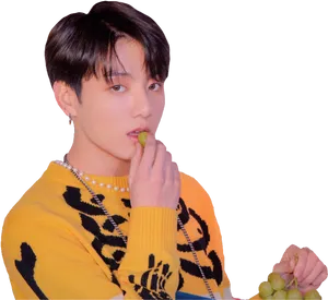 Jungkook Yellow Sweater Grapes PNG image