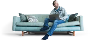 Man Relaxingon Sofawith Laptop PNG image