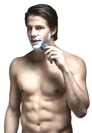 Man Shaving With Razor