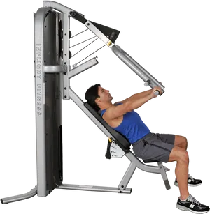 Man Using Chest Press Machineat Gym