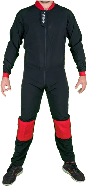 Manin Black Red Suit Standing PNG image