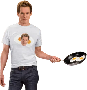 Manwith Egg Bacon Shirtand Frying Pan PNG image