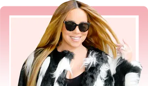 Mariah Carey Smilingin Sunglassesand Fur Coat PNG image