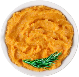 Mashed_ Sweet_ Potato_with_ Rosemary_ Garnish.png PNG image