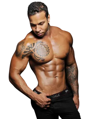 Muscular Manwith Tribal Tattoos PNG image