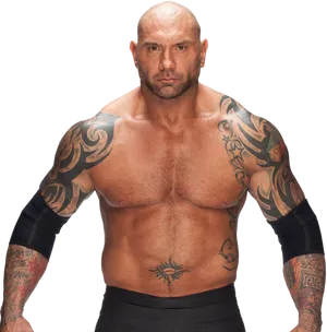 Muscular Tattooed Man Standing PNG image