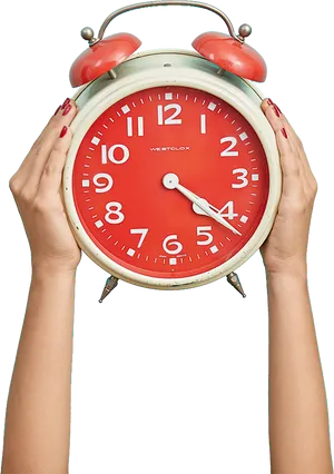 Red Alarm Clock Heldin Hands PNG image