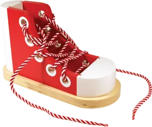 Redand White Laced Wooden Shoe Model PNG image