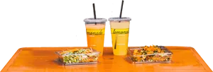 Refreshing Lemonadeand Healthy Saladson Table PNG image