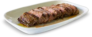 Sliced Grilled Steakon Plate PNG image
