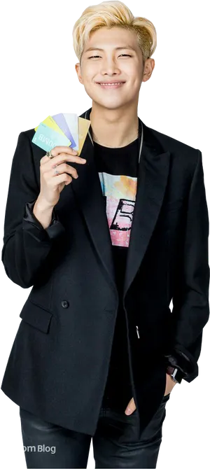 Smiling Man Holding Cards Black Suit PNG image