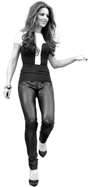 Smiling Womanin Blackand White Outfit