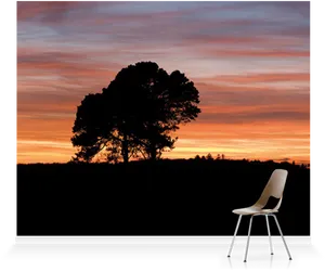Solitary_ Chair_ Under_ Sunset_ Sky PNG image