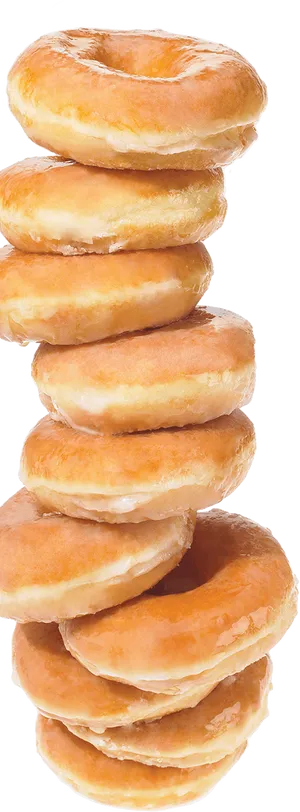 Stacked Glazed Donuts Black Background PNG image