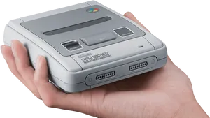 Super Nintendo Consolein Hand PNG image