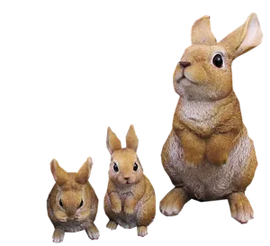 Three Rabbit Figurines Black Background