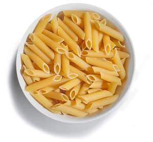 Uncooked Penne Pastain Bowl PNG image