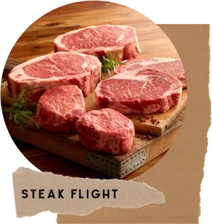 Varietyof Raw Steakson Wooden Board PNG image