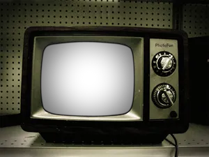 Vintage Televisionon Shelf PNG image