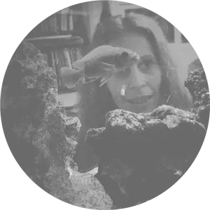 Woman Behind Aquarium Fish