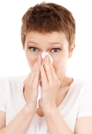 Woman Blowing Nose With Tissue