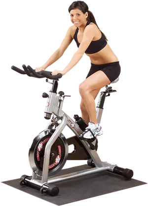 Woman Exercisingon Stationary Bike PNG image