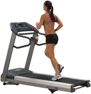 Woman Runningon Treadmill Fitness Equipment PNG image