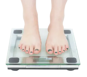 Woman Standingon Digital Scale