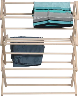 Wooden Clothes Drying Rack With Towels And Pants