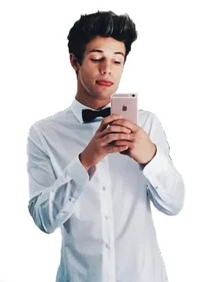 Young Manin Bow Tie Using Smartphone PNG image