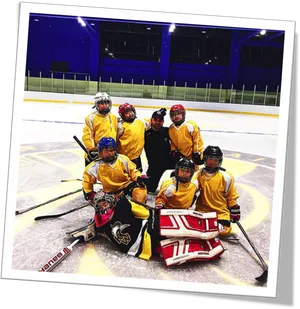 Youth Hockey Teamand Coachon Ice PNG